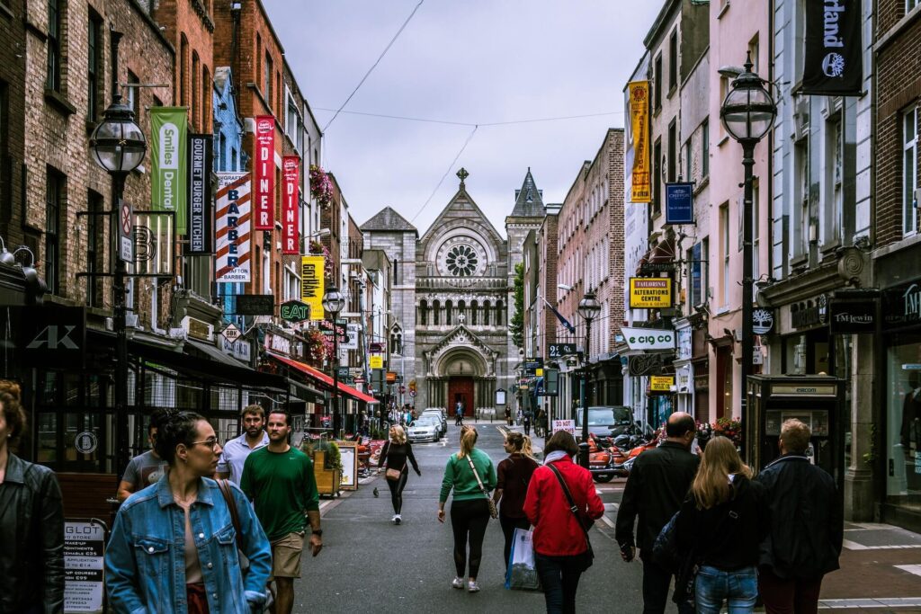 People walking down a busy and colorful street in Dublin, Ireland. Photo: Lukas Kloeppel . City