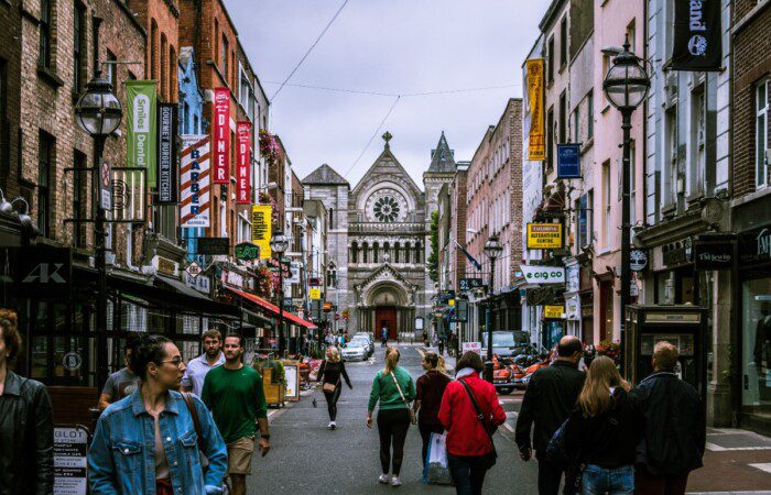 Walking down busy Grafton Street in Dublin Ireland, the shopping district