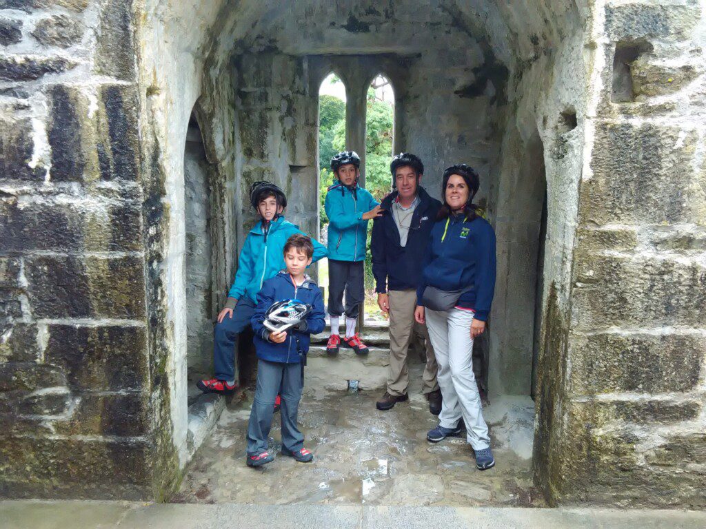 Family exploring muckross abbey in Killarney National Park