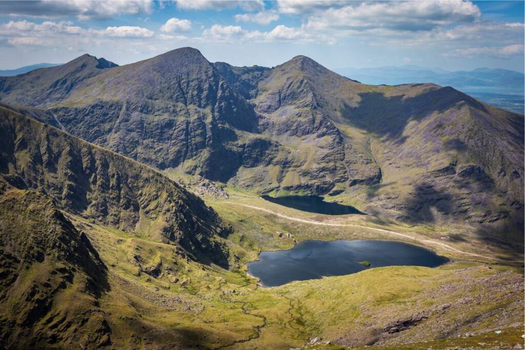 landscape photography of Irish biggest mountain Carrauntoohil and lake at the bottom