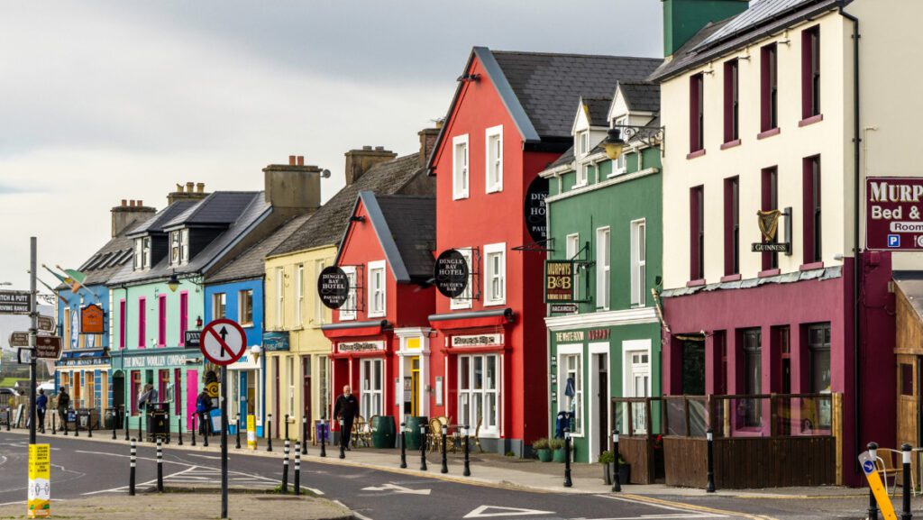 Charming Dingle Town with colorful buildings and a bustling harbor.